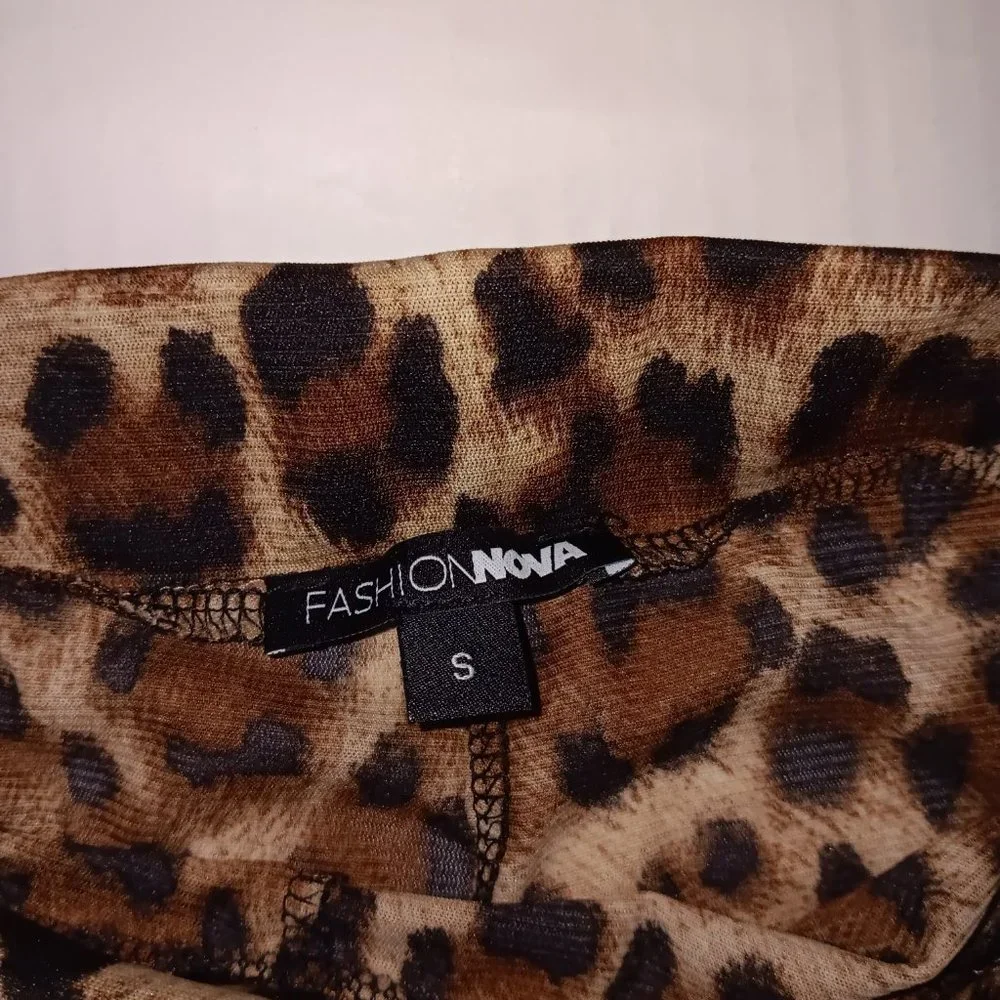 FASHION NOVA SHEER FLARE LEG ANIMAL PRINT PANTS SIZE SMALL